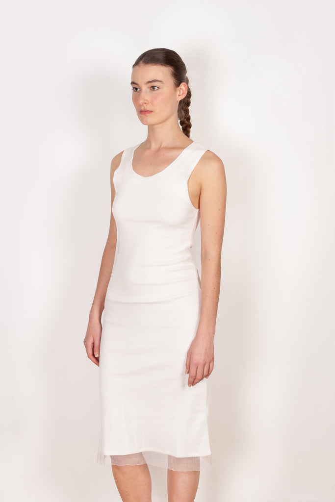 The Double Dress by Botter is a fitted cotton dress with a soft mesh second layer