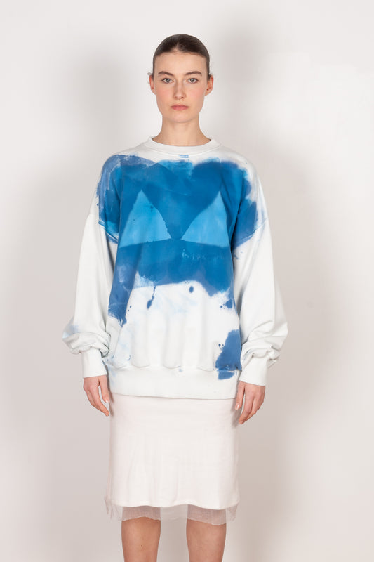 The Hand Painted Sweater by Botter is hand painted tie dye sweater with a front bikini print