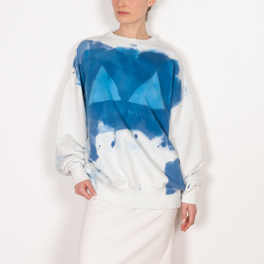 The Hand Painted Sweater by Botter is hand painted tie dye sweater with a front bikini print