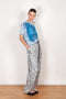 The Pyjama Trousers by Botter are relaxed silk trousers with a seasonal fish print