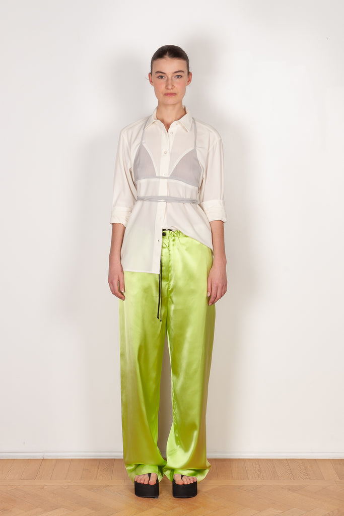 The Pyjama Trousers by Botter are relaxed silk drawstring trousers in a vibrant lime color