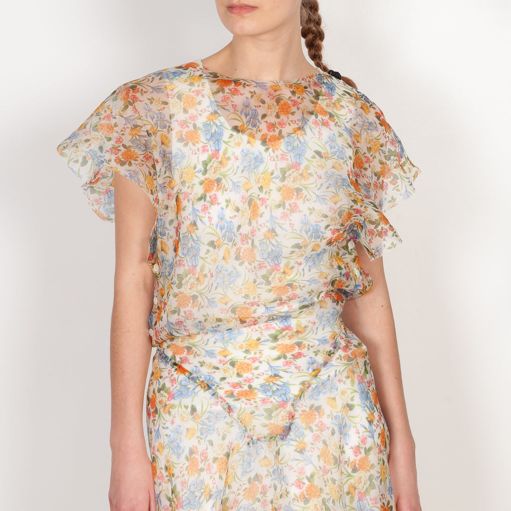 The Swim Dress by Botter is sheer romantic silk dress with an open back in a floral print