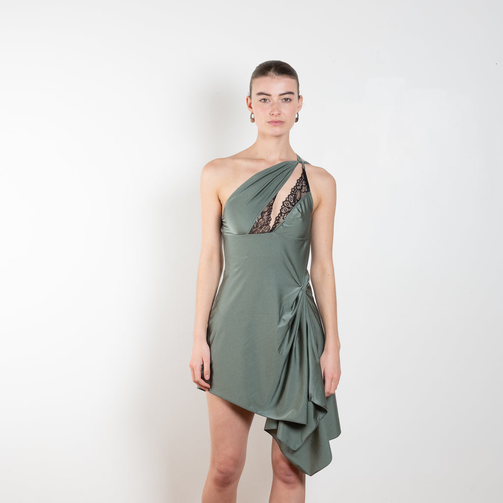 The Asymmetric Mini Dress by Coperni is a draped jersey mini dress with a statement neckline and ruched at the side for a tumbled effect
