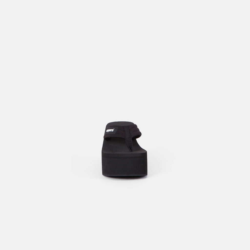 The Branded Wedge Sandal by Coperni is a signature black wedge sandal with lightweight platform soles