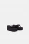 The Branded Wedge Sandal by Coperni is a signature black wedge sandal with lightweight platform soles