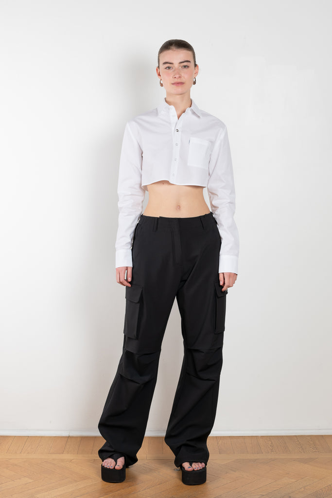 The Cropped Shirt by Coperni is a signature shirt in a crisp cotton with a small silver Coperni button detail