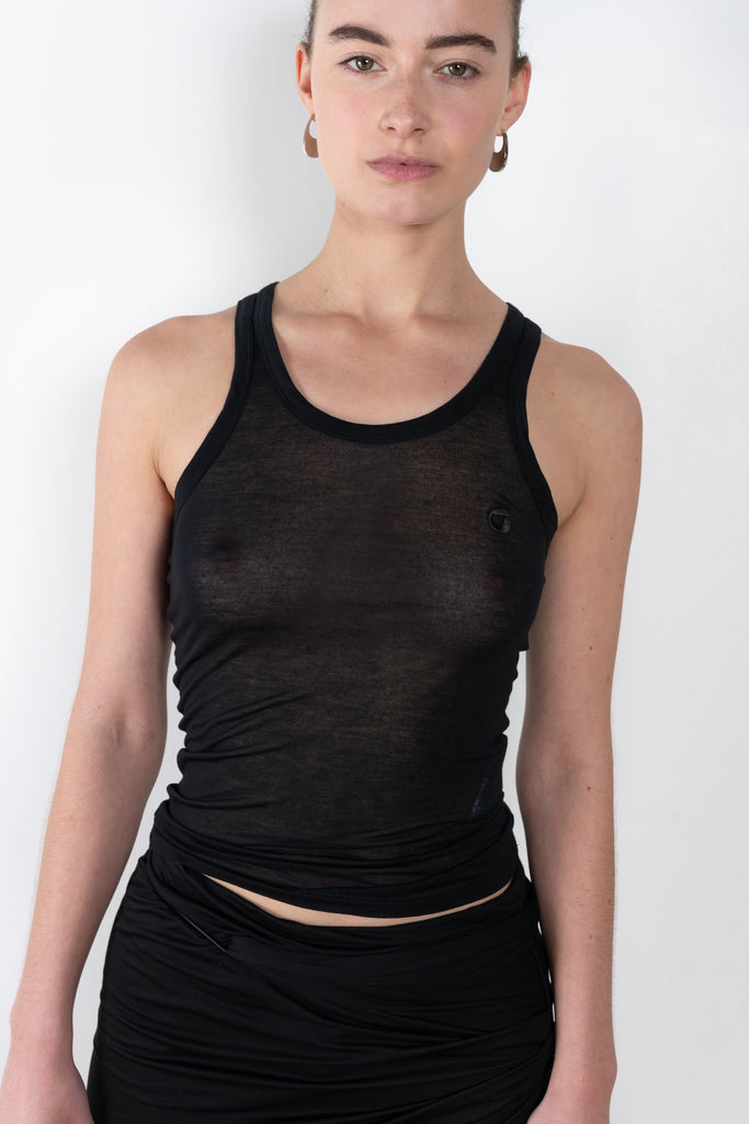 The Lightweight Logo Tank by Coperni is a signature fitted tank top in a soft sheer jersey with a little C Logo on the chest