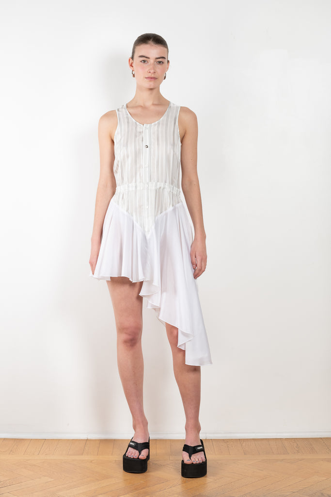 The Vest Dress by Coperni is a runway dress with a striped vest upper and a contrasted asymmetric skirt
