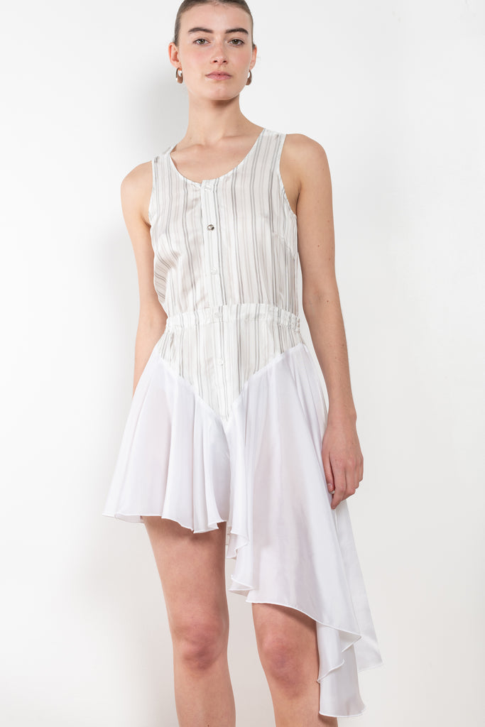 The Vest Dress by Coperni is a runway dress with a striped vest upper and a contrasted asymmetric skirt