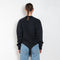 The Sweatshirt Body by Coperni is a signature crewneck sweater with a small slanted Coperni Logo on the front and body details