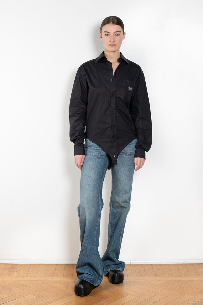 The Body Poplin Shirt by Coperni is a crisp cotton shirt with logo patch and body details