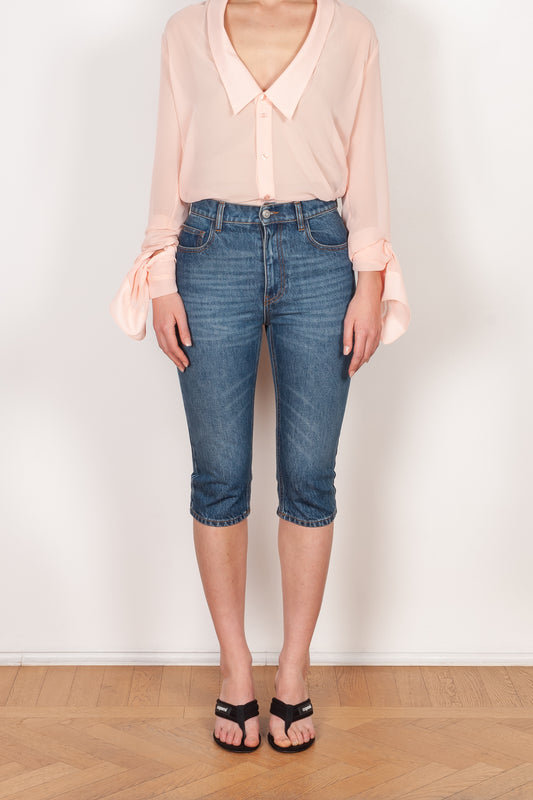 The Cropped Denim Pants by Coperni are high waisted knee length pants with a very fitted silhouette