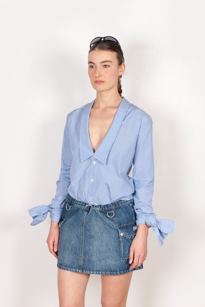 The Denim Cargo Skirt by Coperni are low waisted mini skirts with a signature cargo details