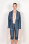 The Denim Jacket by Coperni is a take on the classic denim jacket with a deep open collar