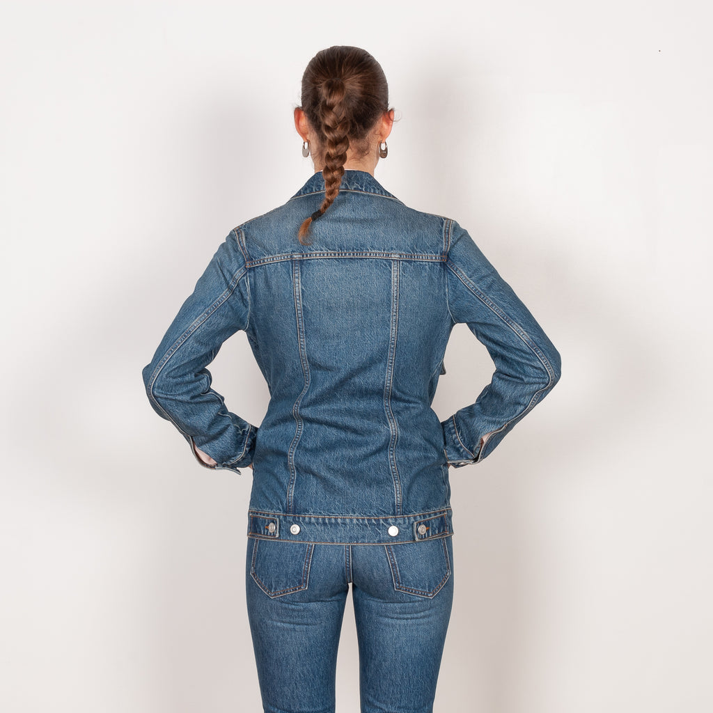 The Denim Jacket by Coperni is a take on the classic denim jacket with a deep open collar