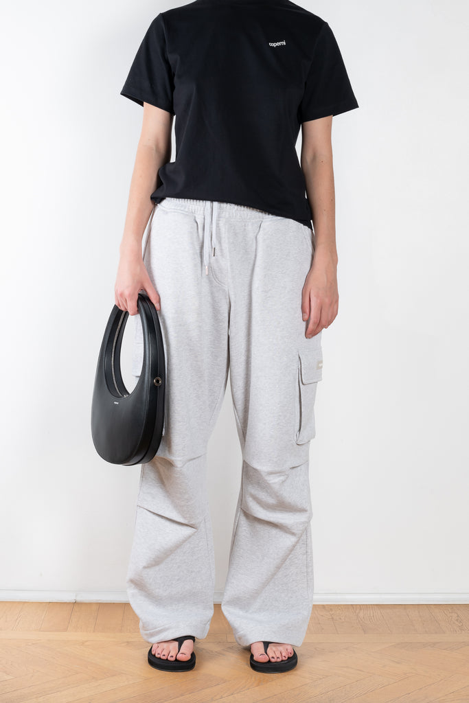 The Fleece Wide Leg cargo pants by Coperni are signature wide jogging pants with cargo details