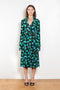 The Print Wrap Dress by Coperni is a feminine wrap dress with a Coperni Logo hardware detail