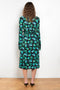 The Print Wrap Dress by Coperni is a feminine wrap dress with a Coperni Logo hardware detail
