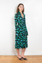 The Print Wrap Dress by Coperni is a feminine wrap dress with a Coperni Logo hardware detail