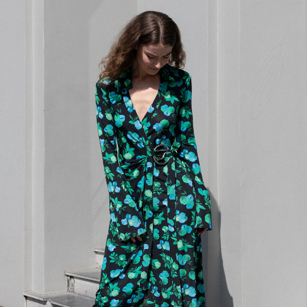 The Print Wrap Dress by Coperni is a feminine wrap dress with a Coperni Logo hardware detail