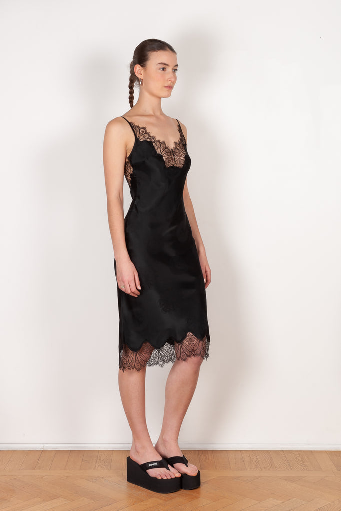 The Jacquard Cymatic Dress by Coperni is a lingerie inspired silk dress with a delicate scalloped lace neckline