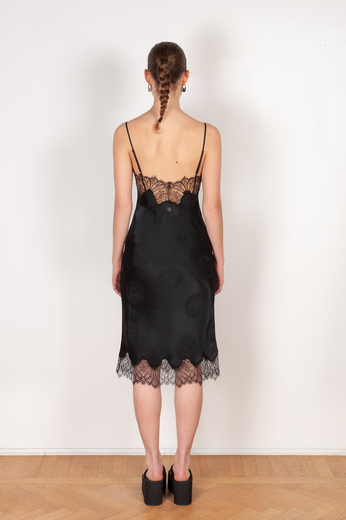 The Jacquard Cymatic Dress by Coperni is a lingerie inspired silk dress with a delicate scalloped lace neckline