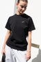 The Logo Boxy T-Shirt by Coperni is a signature relaxed Tee with a small slanted Coperni Logo on the front