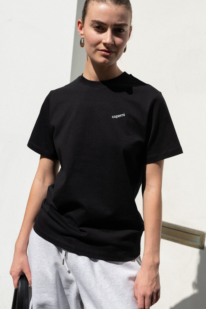 The Logo Boxy T-Shirt by Coperni is a signature relaxed Tee with a small slanted Coperni Logo on the front