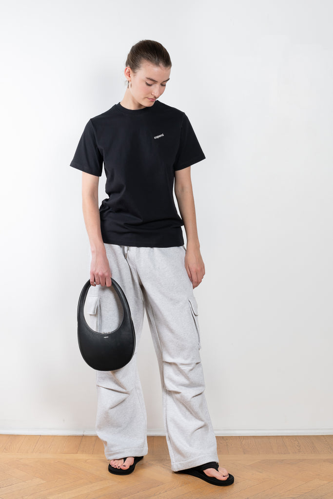 The Logo Boxy T-Shirt by Coperni is a signature relaxed Tee with a small slanted Coperni Logo on the front