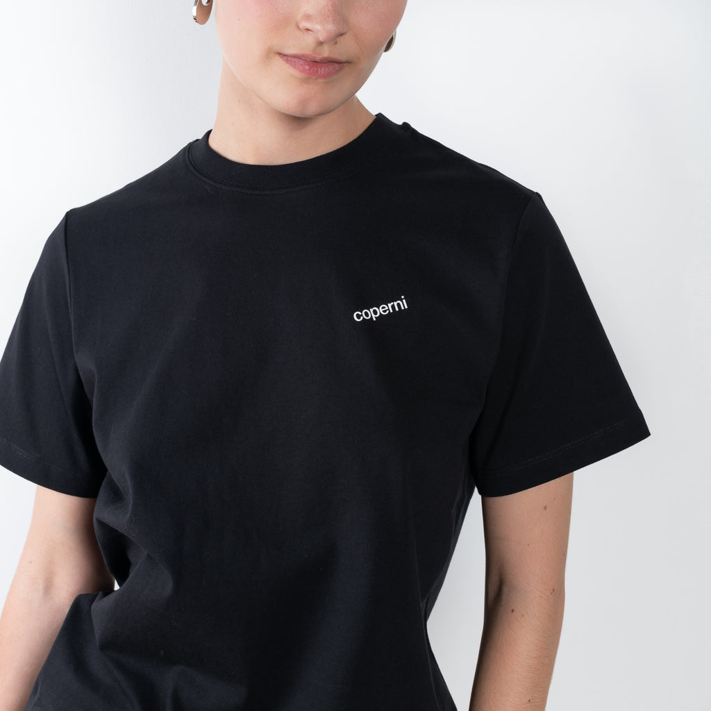 The Logo Boxy T-Shirt by Coperni is a signature relaxed Tee with a small slanted Coperni Logo on the front