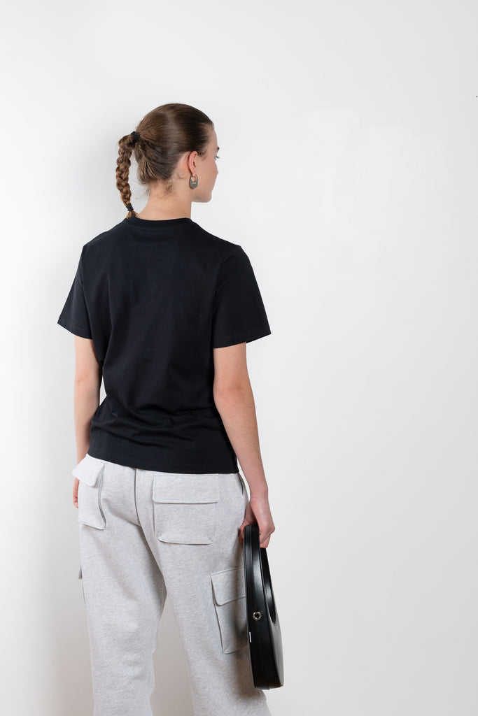The Logo Boxy T-Shirt by Coperni is a signature relaxed Tee with a small slanted Coperni Logo on the front