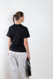 The Logo Boxy T-Shirt by Coperni is a signature relaxed Tee with a small slanted Coperni Logo on the front