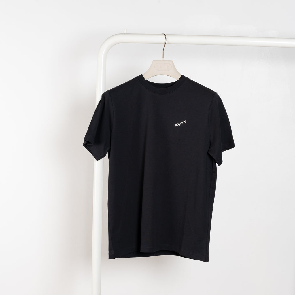 The Logo Boxy T-Shirt by Coperni is a signature relaxed Tee with a small slanted Coperni Logo on the front