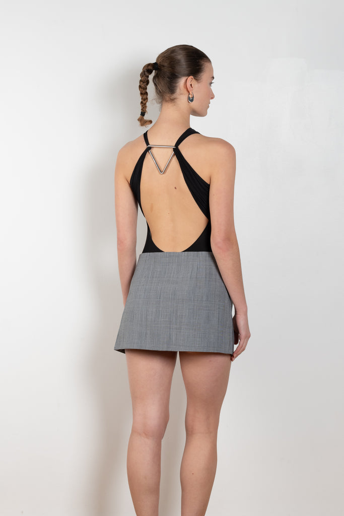 The Triangle Body by Coperni is a fine jersey body with a triangle cut-out at the back