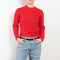 The Carrow Cable Crewneck is a crewneck sweater with a signature cable pattern and a shorter fitted silhouette
