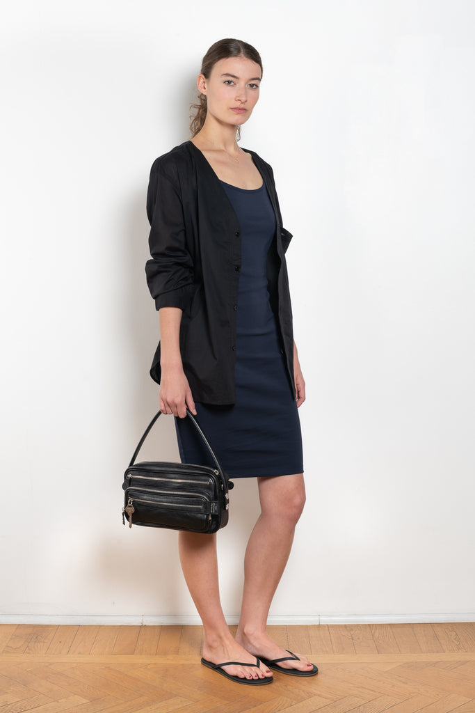 The Bibi Dress by Flore Flore is a fitted camisole dress with a round neck a square backline.