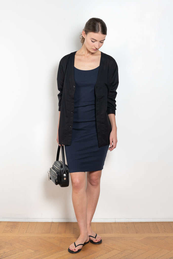 The Bibi Dress by Flore Flore is a fitted camisole dress with a round neck a square backline.