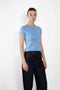The Car Baby Tee by Flore Flore is a fitted t-shirt with a short sleeve