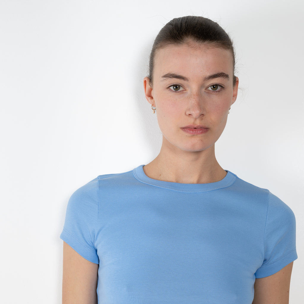 The Car Baby Tee by Flore Flore is a fitted t-shirt with a short sleeve