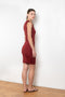 The Esme Dress by Flore Flore is a fitted crew neck tank dress with a double stitched cut-off seam on the back.