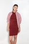 The Esme Dress by Flore Flore is a fitted crew neck tank dress with a double stitched cut-off seam on the back.