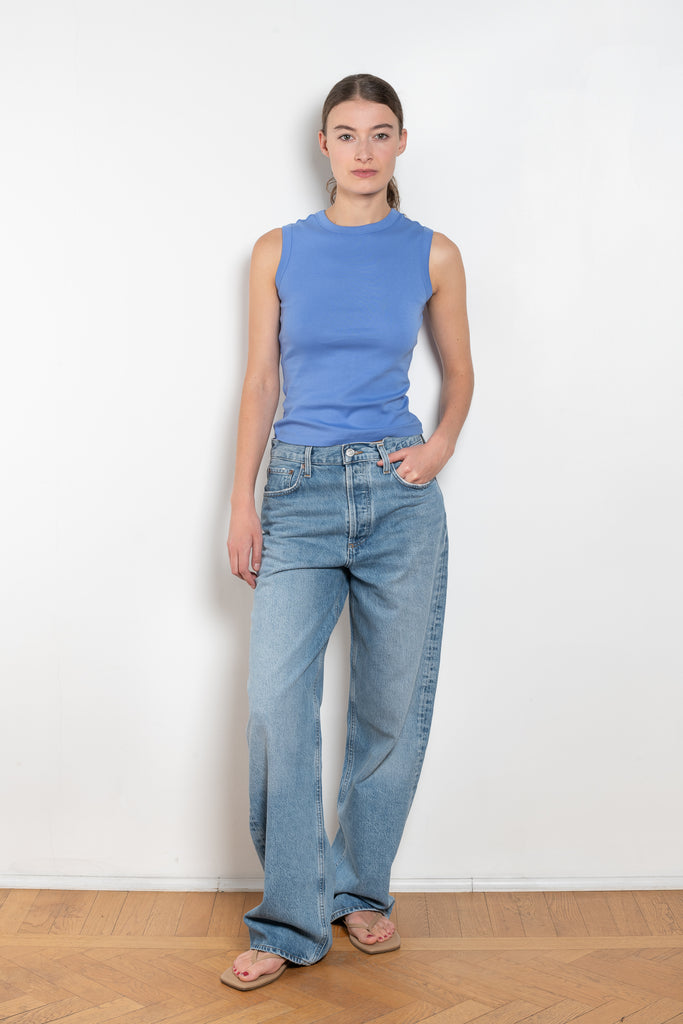 The Esme Tank by Flore Flore is a fitted crew neck tank top with a double stitched cut-off seam on the back.