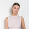 The Esme Tank by Flore Flore is a fitted crew neck tank top with a double stitched cut-off seam on the back.