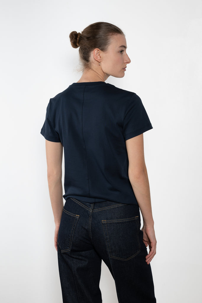 The Monica Tee by Flore Flore is a&nbsp;relaxed fit short-sleeved tee with a double stitched cut off seam on the back