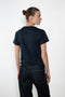 The Monica Tee by Flore Flore is a&nbsp;relaxed fit short-sleeved tee with a double stitched cut off seam on the back