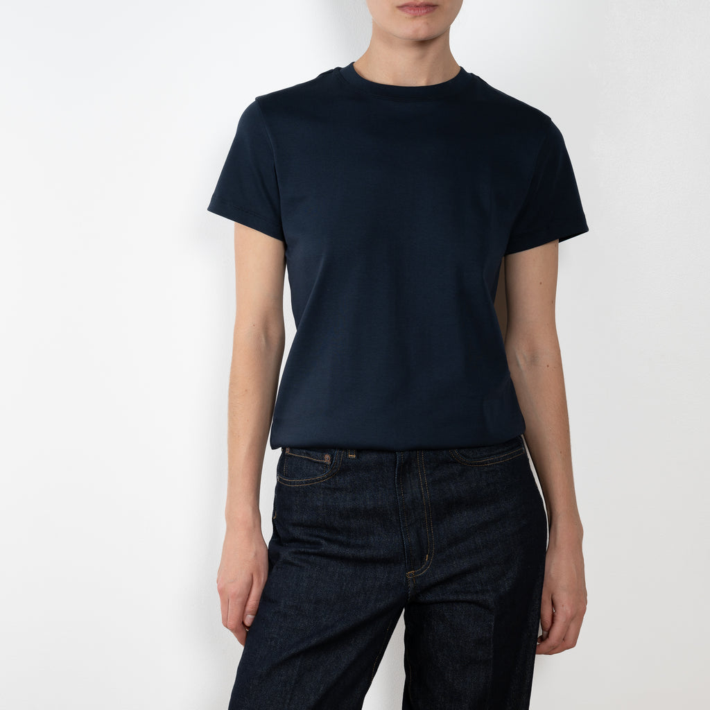 The Monica Tee by Flore Flore is a&nbsp;relaxed fit short-sleeved tee with a double stitched cut off seam on the back