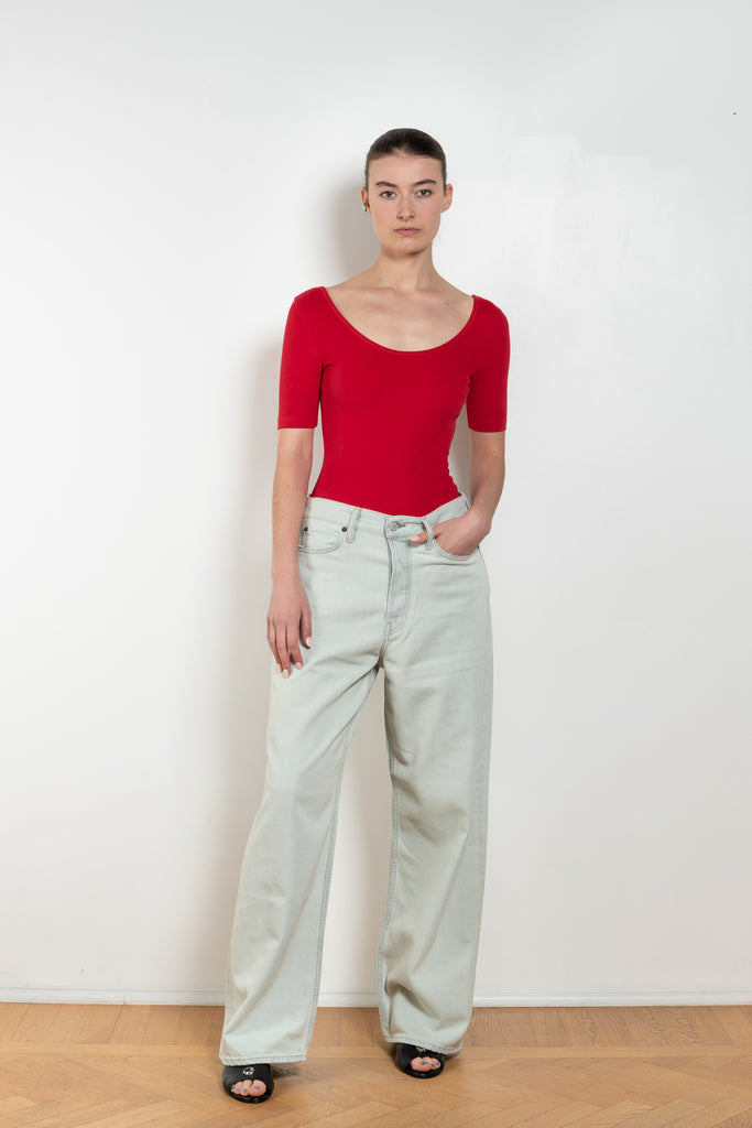 The Pien Body by Flore Flore is a round neck short-sleeve thong bodysuit