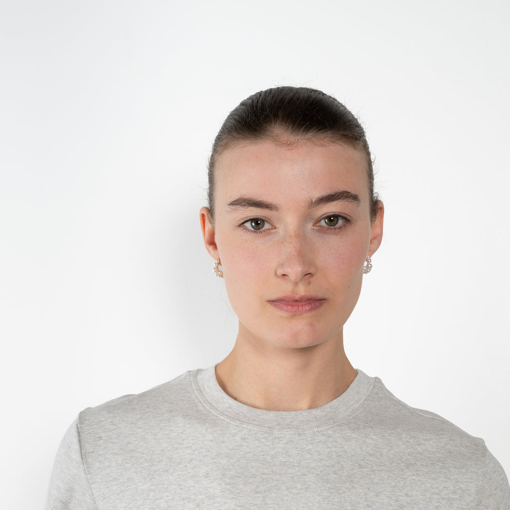 The Monica Tee by Flore Flore is a&nbsp;relaxed fit short-sleeved tee with a double stitched cut off seam on the back.