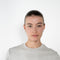 The Monica Tee by Flore Flore is a&nbsp;relaxed fit short-sleeved tee with a double stitched cut off seam on the back.