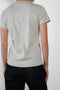 The Monica Tee by Flore Flore is a&nbsp;relaxed fit short-sleeved tee with a double stitched cut off seam on the back.